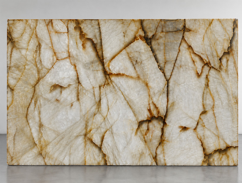 Cristallo quartzite slab with crystal white and gold movement